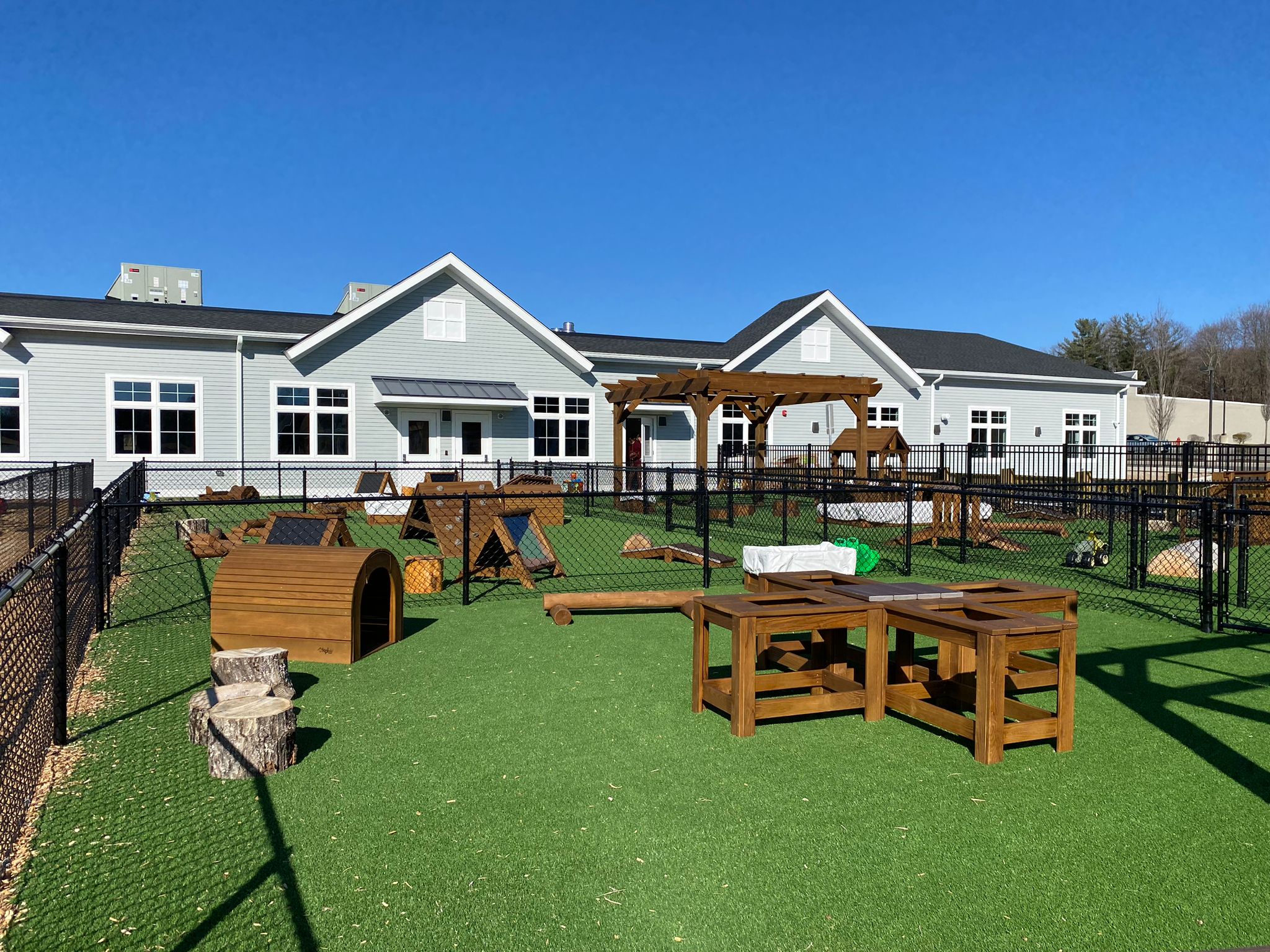 Outside View of BrightPath New Milford Early Learning and Child Care center with Play Structure