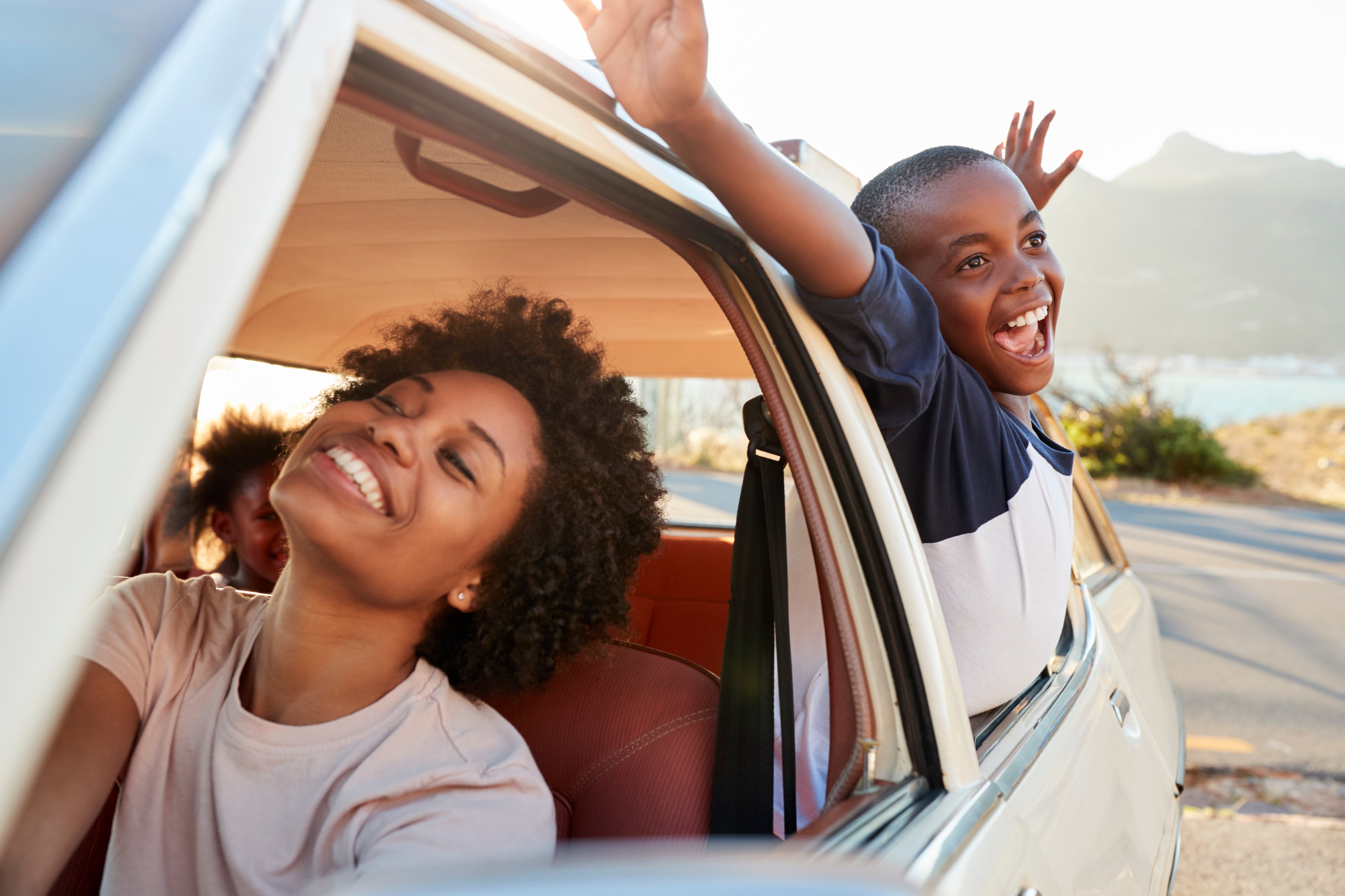 family enjoying a road trip together